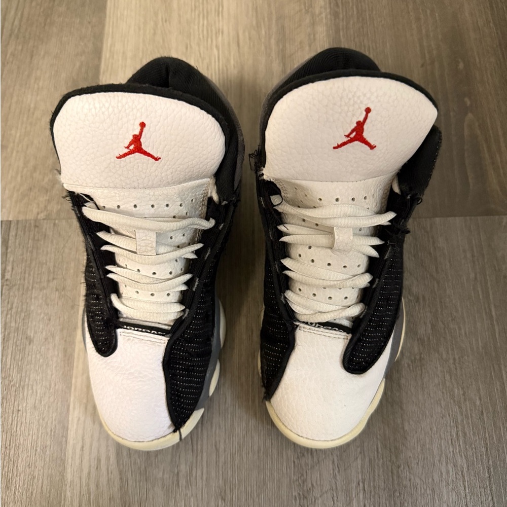 Jordan Kids Black and White Sneakers with Red Accents